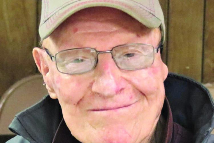 RAYMOND J. TEGTMAN