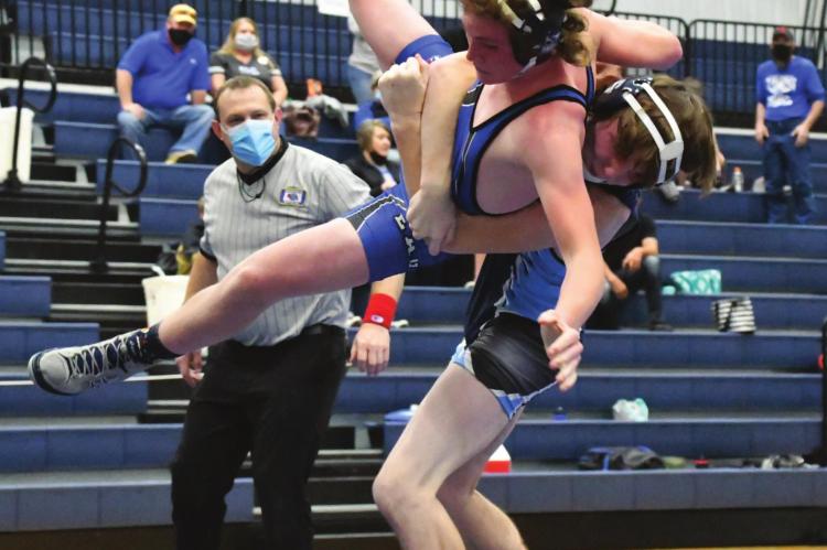 Southwest’s Jacob Kerns takes an opponent to the mat.