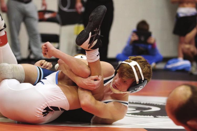 Southwest’s Mitchel Stritt earns a pin.