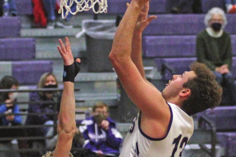 Senior Clayton Berry lays in two of his seven points in the game.