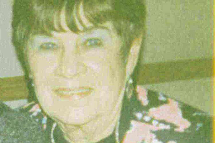 MAXINE L. MCCOY