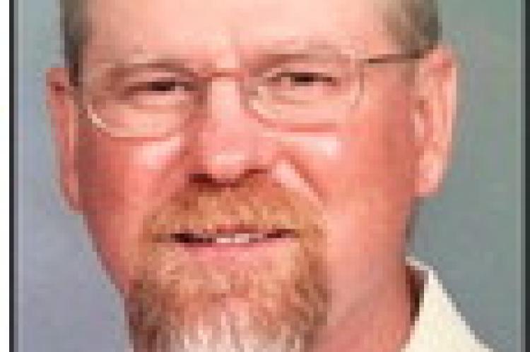 DUANE J. FISCHER