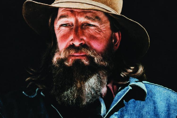 GLEN L. WOLZEN