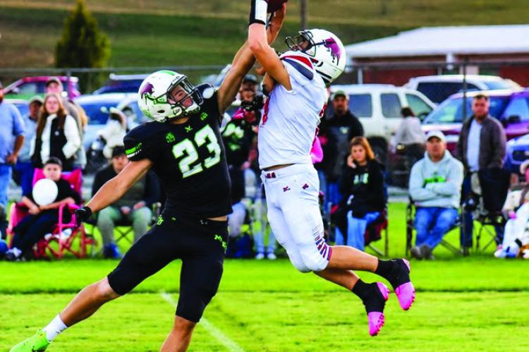 Maywood/Hayes Center’s Leo Anders and Hi-Line’s Lucas Cochrane battle for a ball in the center of the field.