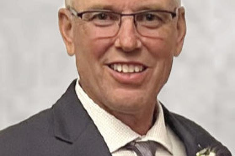LARRY K. NEWCOMB