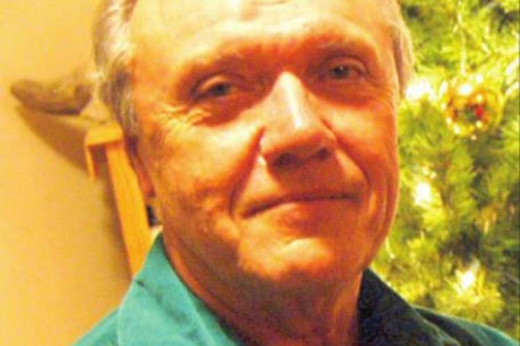 WARREN E. HARPER