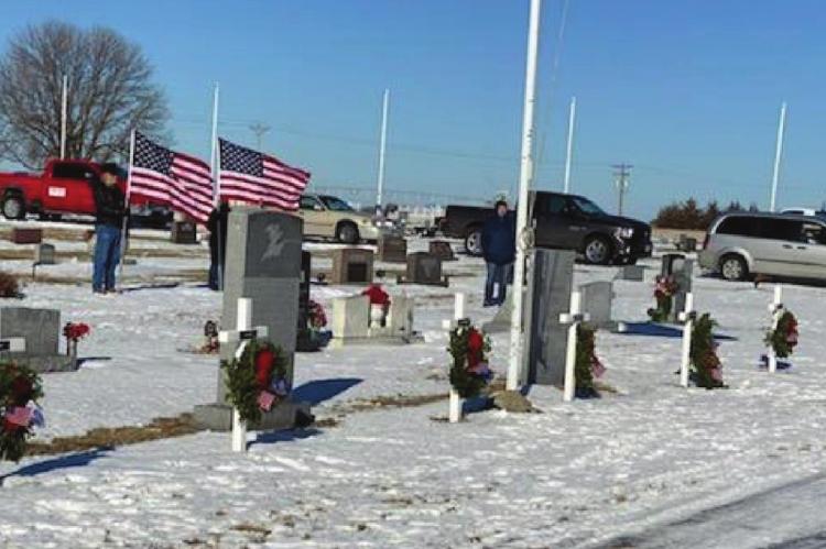 Wreaths were placed on the crosses that designate the different branches of service at the Elwood Cemetery. Wreaths were also laid at the East and West Salem Cemeteries.