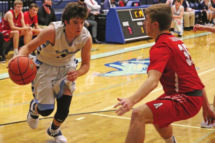 Southwest’s Zack Ryan drives into the paint against Alma Last week.