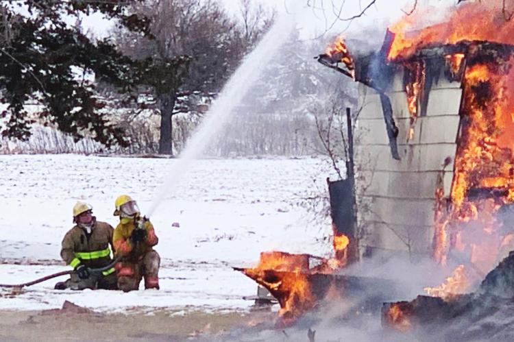 Beaver City - The Beaver City Fire Department conducted a controlled burn for training on Saturday, December 12. The department burned down a house at 406 S Street. The streets surrounding the house were blocked off to traffic. There were onlookers that watched the burn as the house was eventually burned to the ground.