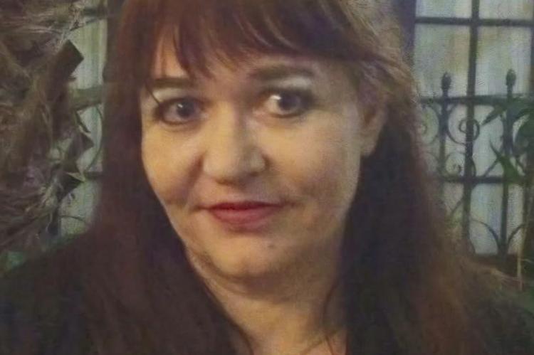 CATHY M. KUMM