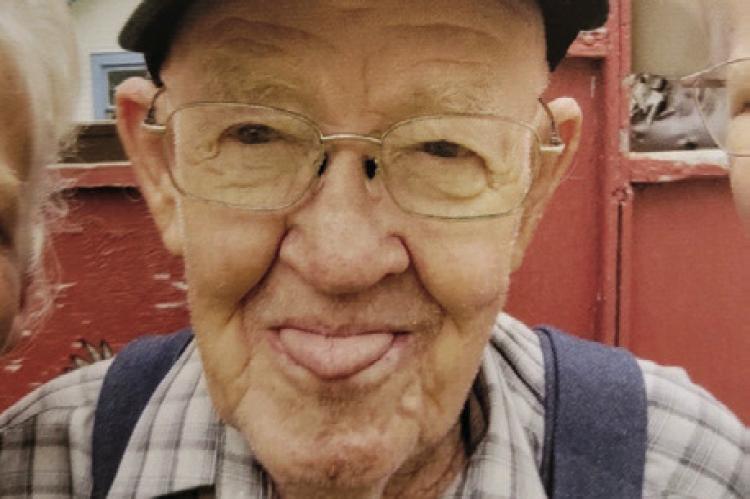 CHARLES H. HUXOLL