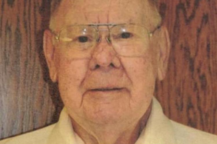 RUSSELL E. HILKER