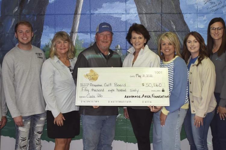 Arapahoe Gala & Arapahoe Area Foundation presents check