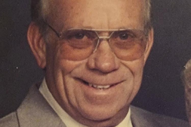 LELAND M. “BUD” WARNER