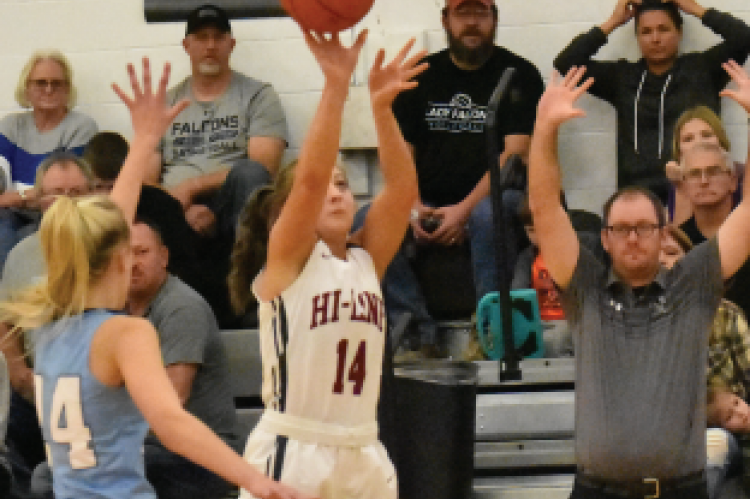 Zoey Evans rises for a three from the wing