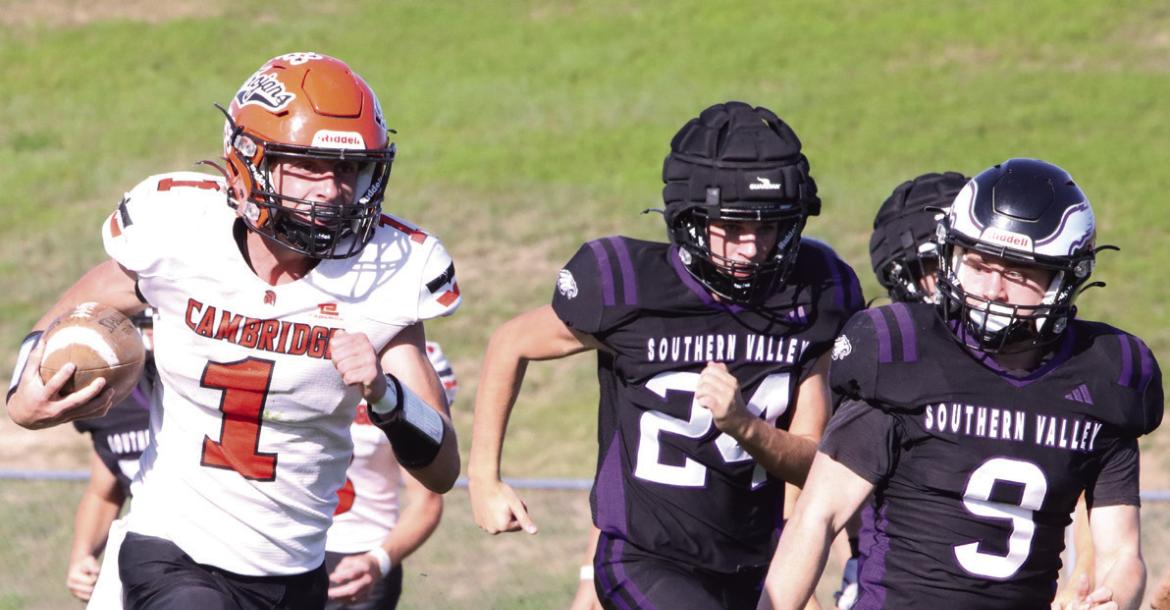 Cambridge’s Braxton Mitchell escapes on a 68-yard kickoff return touchdown to open the second half Friday.
